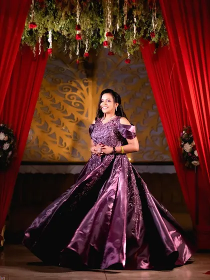 A full-length portrait capturing the elegance and grace of the bride-to-be in her beautiful gown.