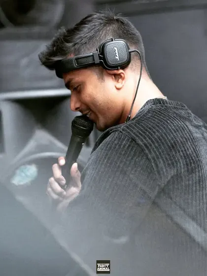  "Say Alhamdulillah and smile." A moment of quiet gratitude captured on the mic, a reminder of the blessings behind the success.