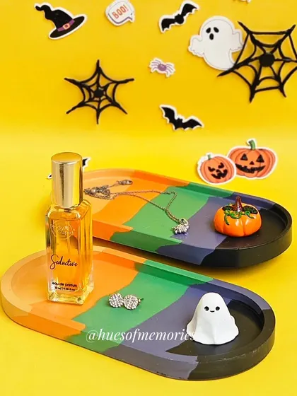 These oval trays are great for holding jewelry, perfume, or other small items, adding a touch of creative and spooky flair to your vanity.