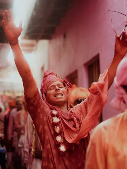 A comprehensive photo series from Lathmaar Holi in Barsana. These images document the unique tradition where women playfully hit men with sticks, recreating a legend of Lord Krishna and Radha. The photos are filled with motion, color, and raw emotion.