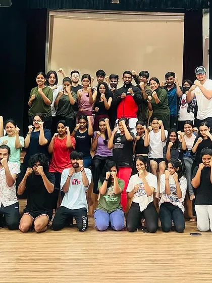 A group photo with the participants of the NIFT karate seminar, celebrating their new skills and confidence.