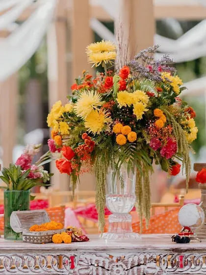These images and videos showcase the rich variety of details, floral arrangements, and decor elements that bring our vibrant Haldi and Mehendi celebrations to life.