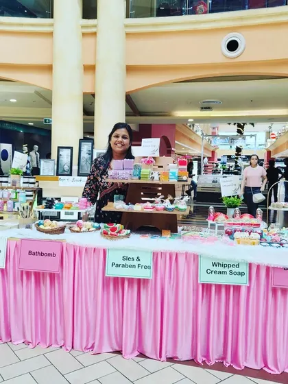 Another shot of me at my exhibition stall, surrounded by all my handmade creations.