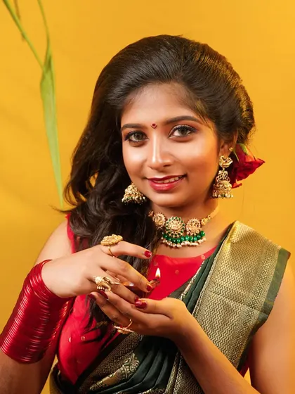 A close-up from a Pongal photoshoot featuring a beautiful green-beaded choker. I offer many unique individual pieces for you to mix and match.