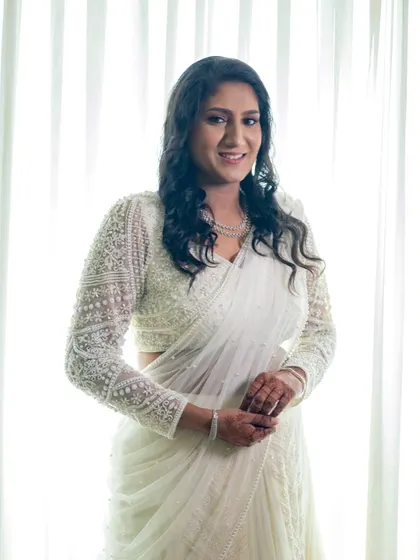 Creating a dreamy glow for her engagement. This bride in her elegant white saree looks timeless and perfectly herself.