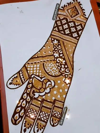 A very intricate bridal design practice sheet, filled with peacocks, florals, and geometric patterns. This level of detail is what we work towards in my comprehensive bridal mehndi course.