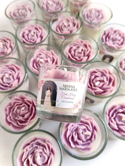 An overhead shot of the purple peony candles, with one in the center showing the custom sticker for Areena's special day.