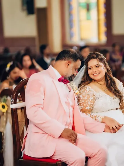 Another beautiful shot from the ceremony. The bride looks at her groom with so much love, her face glowing with happiness.