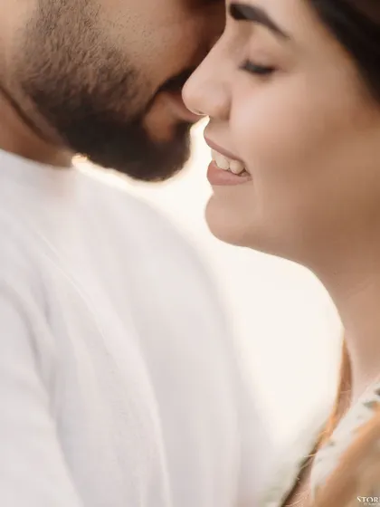 An extreme close-up focusing on the intimacy and tenderness of the moment, a signature of my storytelling style.
