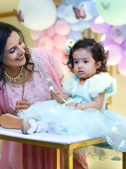 The adoration in a mother's eyes. We focus on capturing these genuine emotions that tell the story of your family's love.