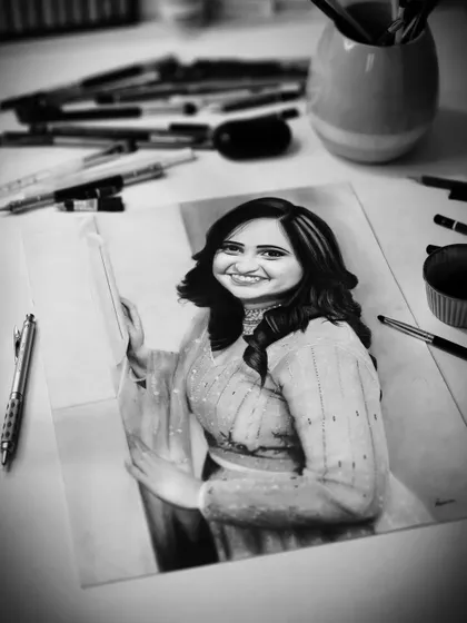 The portrait on my desk surrounded by my tools.