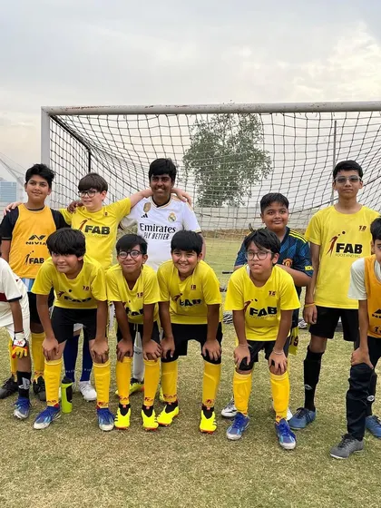 A team photo before a friendly match. We prepare our players for effective teamwork and future challenges.