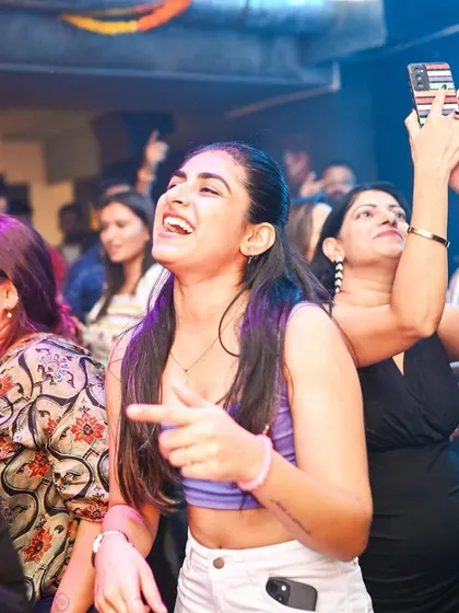 Another happy face on the dance floor during the Diwali party. The joy is contagious.