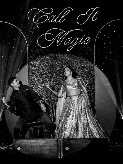 The couple's performance on a stage with a "Call It Magic" sign and a confetti blast.