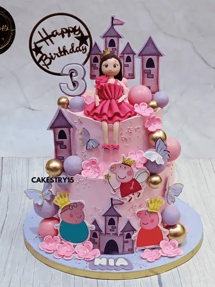 A fun and colorful two-tier Peppa Pig cake. This choco-vanilla cake features Peppa, George, and a castle, all in a playful pink and purple design perfect for a third birthday.
