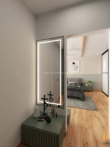 The dressing area, with a sleek, backlit mirror and a compact vanity table that continues the room's color scheme.