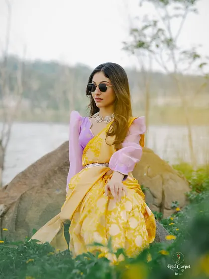 A cool, modern take on saree styling, with Sanjana Rao pairing the traditional drape with sunglasses.