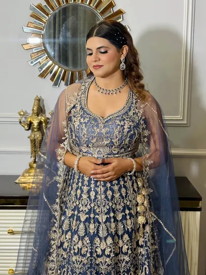 A three-quarter view of the client, showing the hairstyle and makeup from another angle.