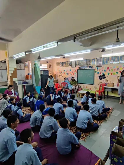 Our team addresses a school assembly, introducing the day's activities and getting everyone excited about the science they are about to explore.