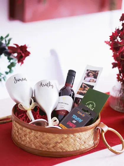 The 'Romantic Escape' hamper set up for a romantic evening, ready to be enjoyed.