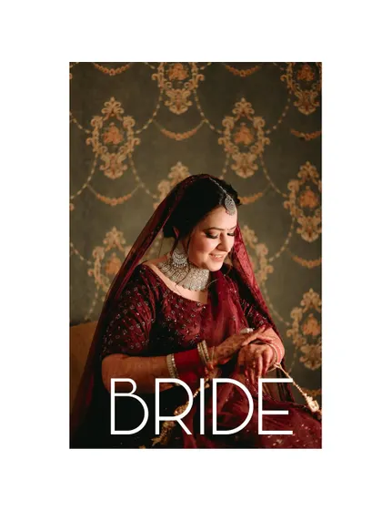 A classic, single-frame bridal portrait that exudes elegance and grace, with the bride looking thoughtful and serene.