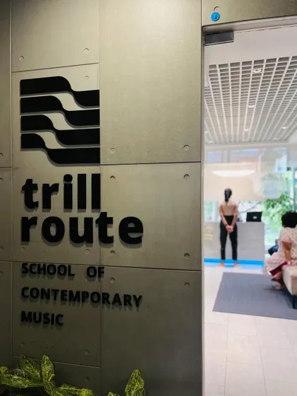 Our logo on the wall of our school. It represents our commitment to contemporary music and the journey of learning.