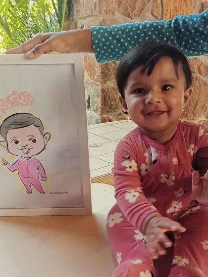 It's pure joy drawing for the little ones. This adorable baby now has her first-ever caricature, a framed piece that her family will treasure for years. My service is a hit at first birthday parties and family functions.