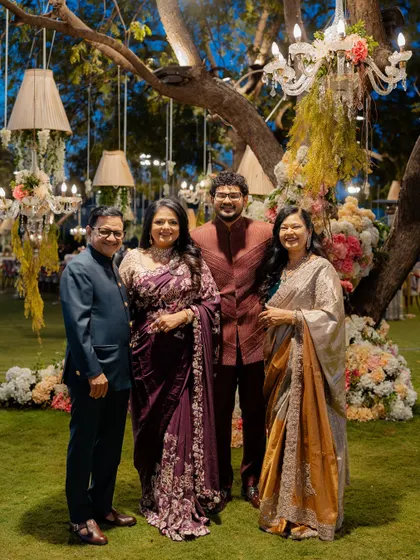 A family portrait from the pre-wedding reception, showcasing our ability to style the entire family in a cohesive, elegant theme.
