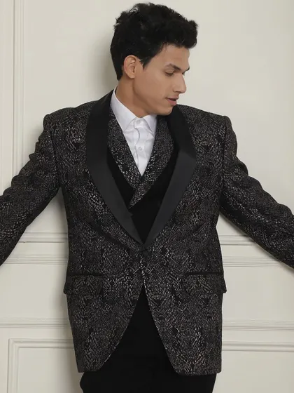 Another angle of our black and silver patterned jacket, showing its dynamic texture and shine.