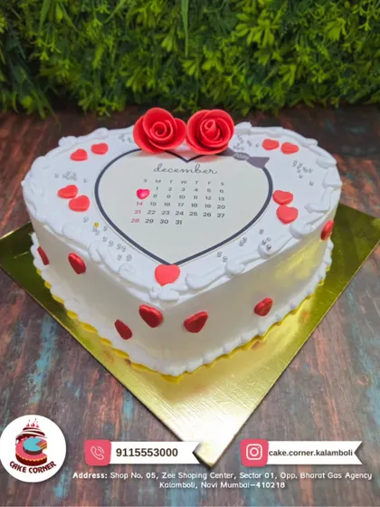 A heart-shaped cake that marks a special date on a calendar. This is a unique and personal way to celebrate an anniversary or remember a significant day.