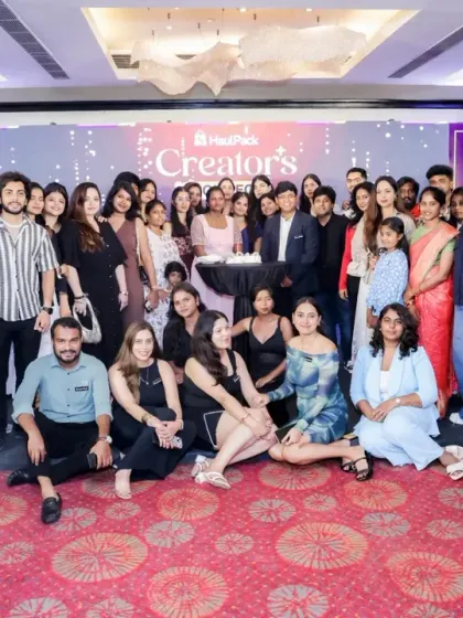 A celebratory group photo from the Creator's Connect event. We are skilled at organizing and capturing large group shots that serve as a great memento for your team and attendees.
