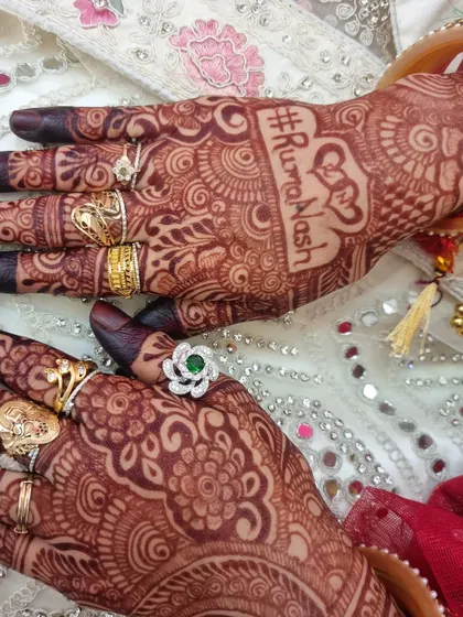 A duplicate of 95, showing the same close-up of the wedding hashtag.