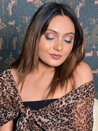 The overall look is chic and sophisticated. It's a great example of a soft glam look that can be worn for any special event.