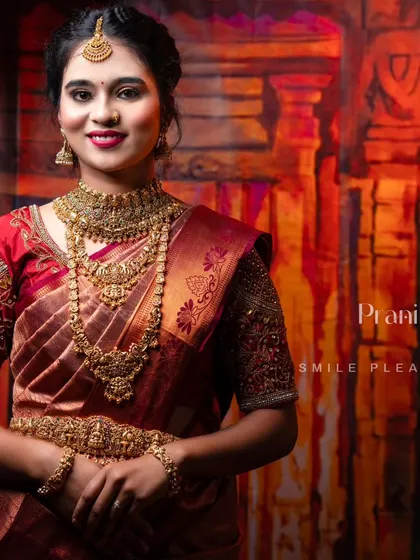 A full view of the bridal set, including the intricately designed oddiyanam (waist belt) that completes the traditional South Indian bride's attire.