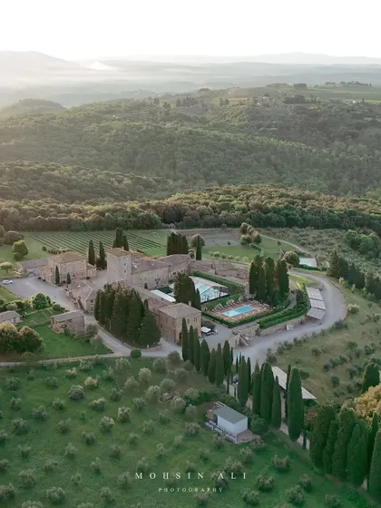 A breathtaking drone shot of the wedding venue in Tuscany, Italy. This shows the scale and beauty of the locations we get to work in, surrounded by rolling hills and vineyards.
