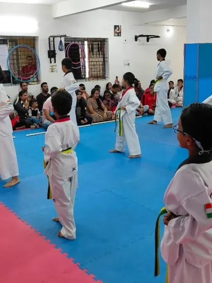 I observe a class of yellow and green belts.