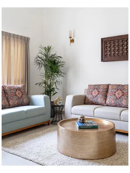A cherished wooden piece, the first furniture the clients bought as a married couple, repurposed as wall art. This personal touch encapsulates treasured memories and adds emotional depth to the family lounge.