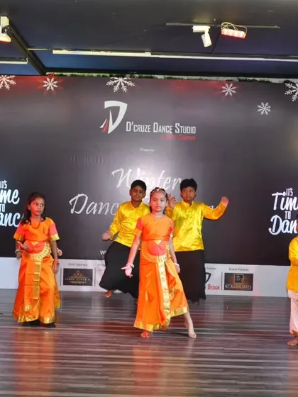 The full group of our 3-6 year old grooming kids performing on stage.
