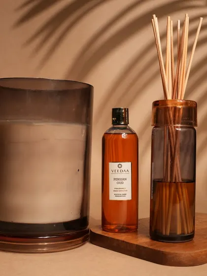 The sophisticated pairing of our Persian Oud candle and reed diffuser. The smoky glass and rich, woody fragrance create an atmosphere of pure luxury and warmth.