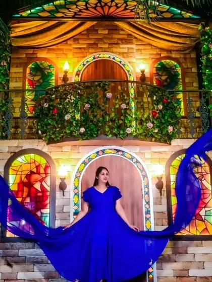 A solo portrait featuring our royal blue flying dress. The trails are spread out to the sides, creating a dramatic and symmetrical look.