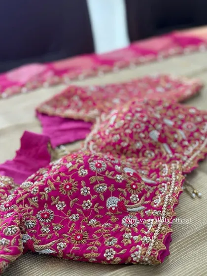 Multiple pink blouses, each with a unique heavy embroidery pattern.