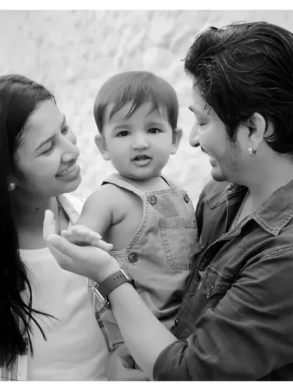 A classic family portrait in black and white. We love capturing these moments of connection between parents and their child.
