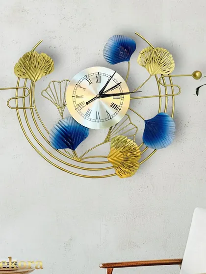 The vibrant colors and delicate metalwork of this ginkgo leaf clock make it a beautiful piece of functional art.