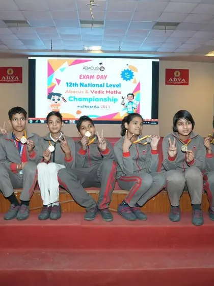 Victory poses from another group of winners. The camaraderie and shared success make these events truly special for the kids.
