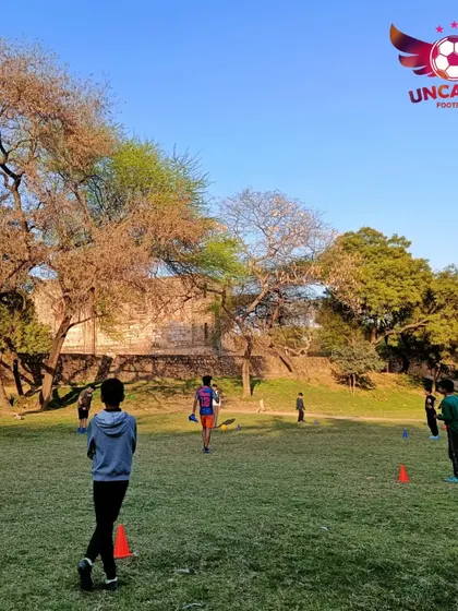 Another glimpse of a training session in progress. You can see the open space and historical surroundings of our home ground at Jamali Kamali.