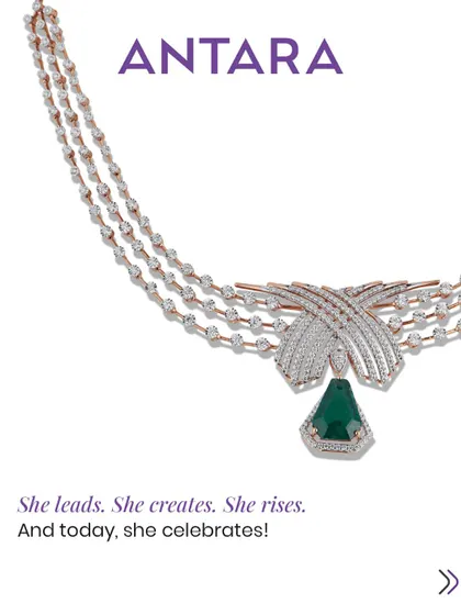 She leads. She creates. She rises. And today, she celebrates. This elegant three-strand diamond necklace with an emerald drop is a tribute to her achievements.