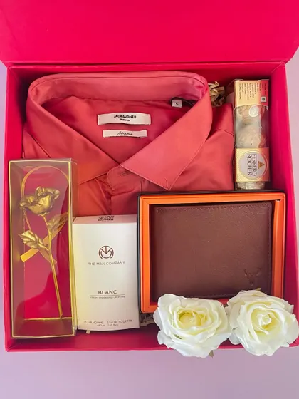 Gifting isn't just for festivals. We create custom hampers for all occasions, like this Valentine's Day box for him, which includes a shirt, wallet, perfume, and other thoughtful items.