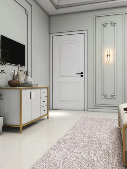 An angle showing the TV console and the elegant door design that matches the wall mouldings. This demonstrates our commitment to creating a fully coordinated and harmonious interior.