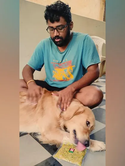This is Simba, one of our happy customers, getting some love from his human. We make food that's not just healthy but also brings joy to both pets and their parents.