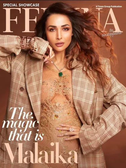 The stunning cover of Femina, featuring Malaika Arora styled by our team. This look, with a plaid blazer over a delicate lace dress, plays with masculine and feminine elements for a powerful fashion statement.